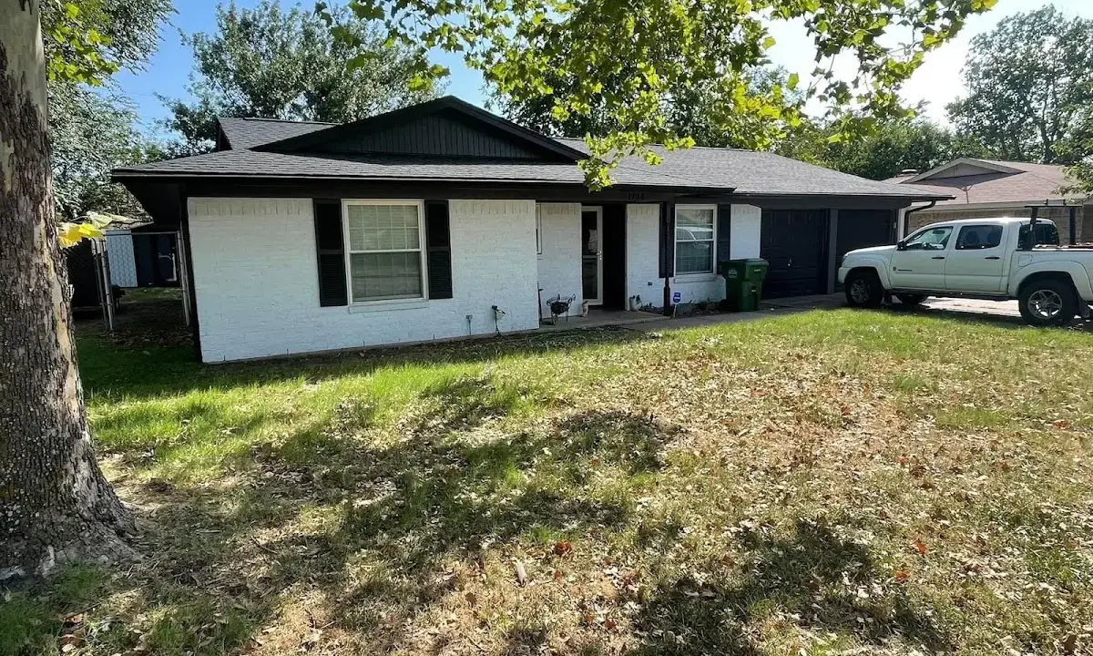 Professional roofing crew working on a residential roof in Carbondale